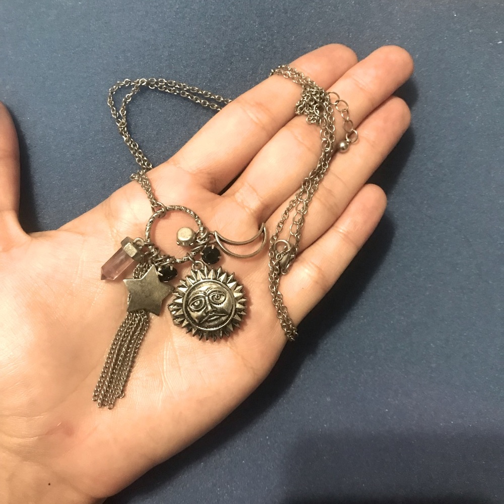 Earthbound pendant with charm